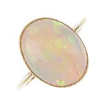 An opal single-stone ring. The oval opal cabochon, with pierced lattice gallery, to the tapered