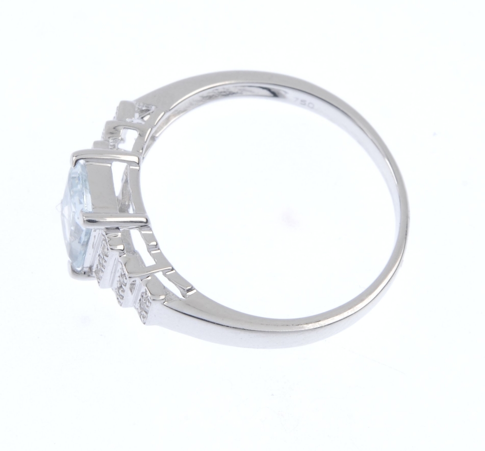 An 18ct gold aquamarine and diamond ring. The rectangular-shape aquamarine, to the single-cut - Image 3 of 4