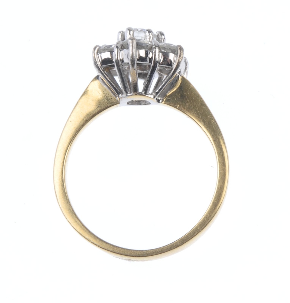 A diamond cluster ring. Of floral design, the brilliant-cut diamond cluster, to the tapered - Image 2 of 4