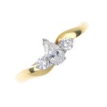 An 18ct gold diamond three-stone ring. The pear-shape diamond, to the brilliant-cut diamond