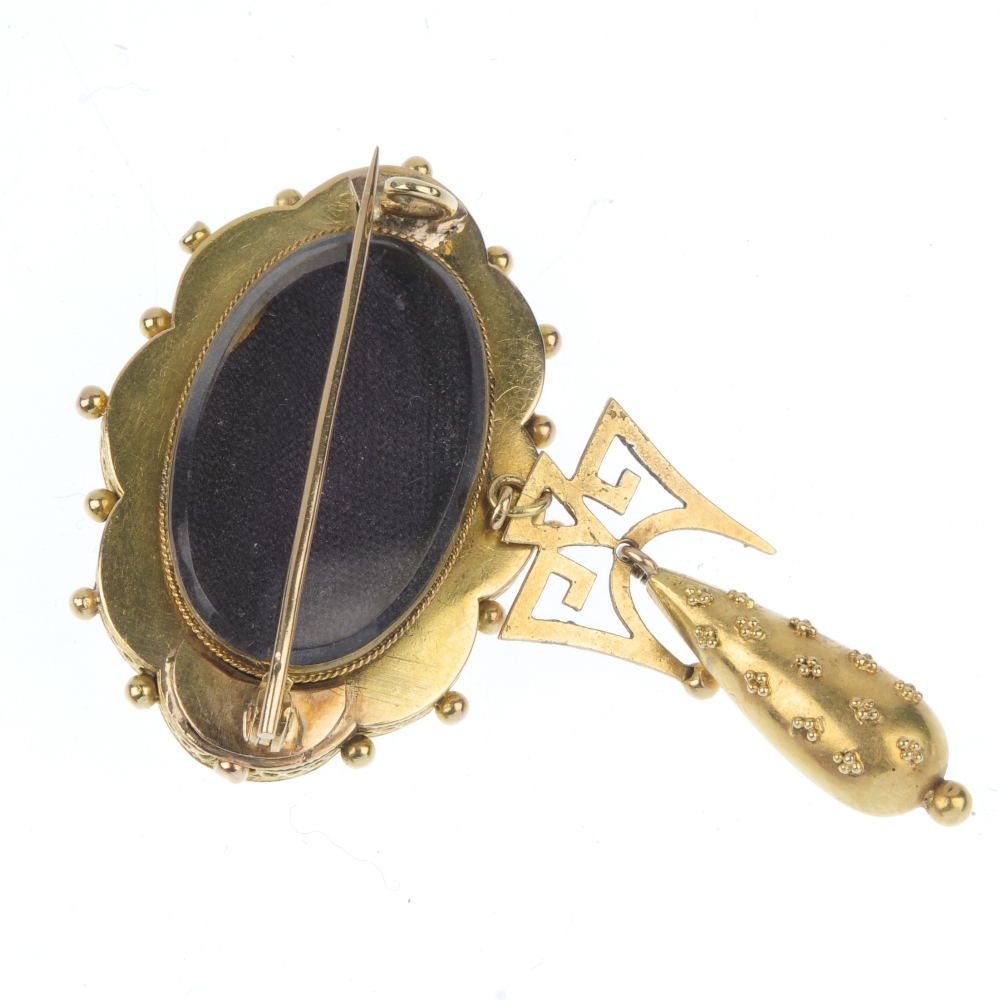 A late 19th century gold diamond brooch. The old-cut diamond oval panel, within a cannetille - Image 2 of 2