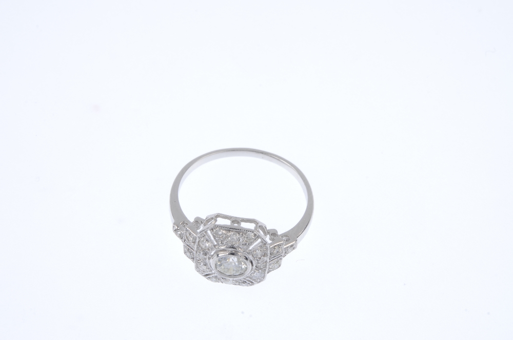 A diamond dress ring. The brilliant-cut diamond collet, to the similarly-cut diamond panel and - Image 2 of 4