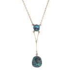 An early 20th century 9ct gold turquoise necklace. The cushion-shape turquoise matrix cabochon,