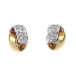 A pair of 18ct gold diamond earrings. Each of bi-colour design, comprising pave-set and polished,