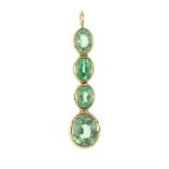 A tsavorite garnet pendant. Designed as a graduated oval-shape tsavorite garnet line. Length 2.5cms.