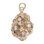 A diamond nugget pendant. The free-form nugget, with vari-size brilliant-cut diamonds inset, to