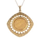 (120207) A 9ct gold half sovereign coin pendant. The half sovereign coin, dated 1902, within a