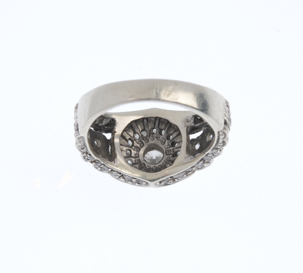 (15968) A 9ct gold diamond dress ring. Designed as a brilliant-cut diamond collet within a - Image 2 of 4