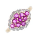 A 9ct gold ruby and diamond cluster ring. Of marquise-shape outline, the circular-shape ruby