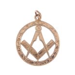 An early 20th century 9ct gold Masonic fob. Of openwork design, the engraved compass and set-square,