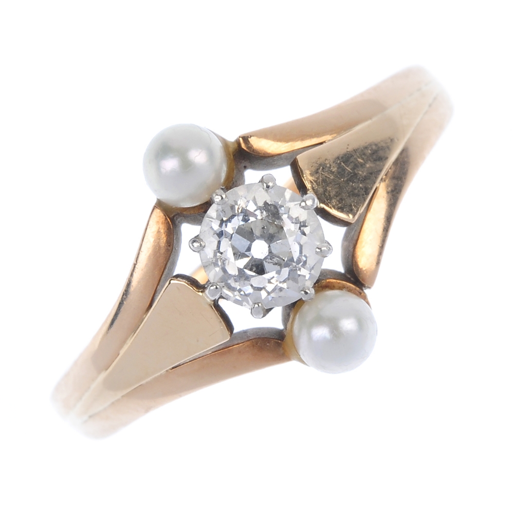 An early 20th century gold diamond and cultured pearl ring. The old-cut diamond and cultured pearl