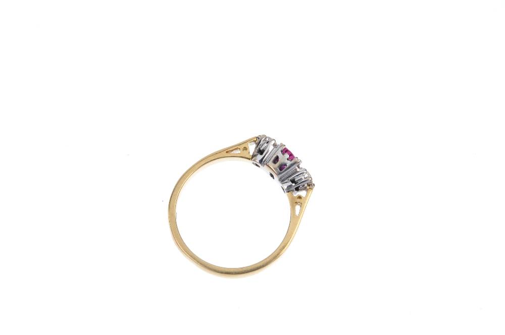 An 18ct gold ruby and diamond three-stone ring. The oval-shape ruby, with brilliant-cut diamond - Image 4 of 4