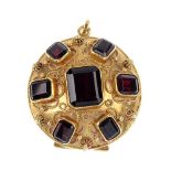 A garnet hinged locket. Of domed outline, the rectangular-shape garnet, within a similarly-shaped