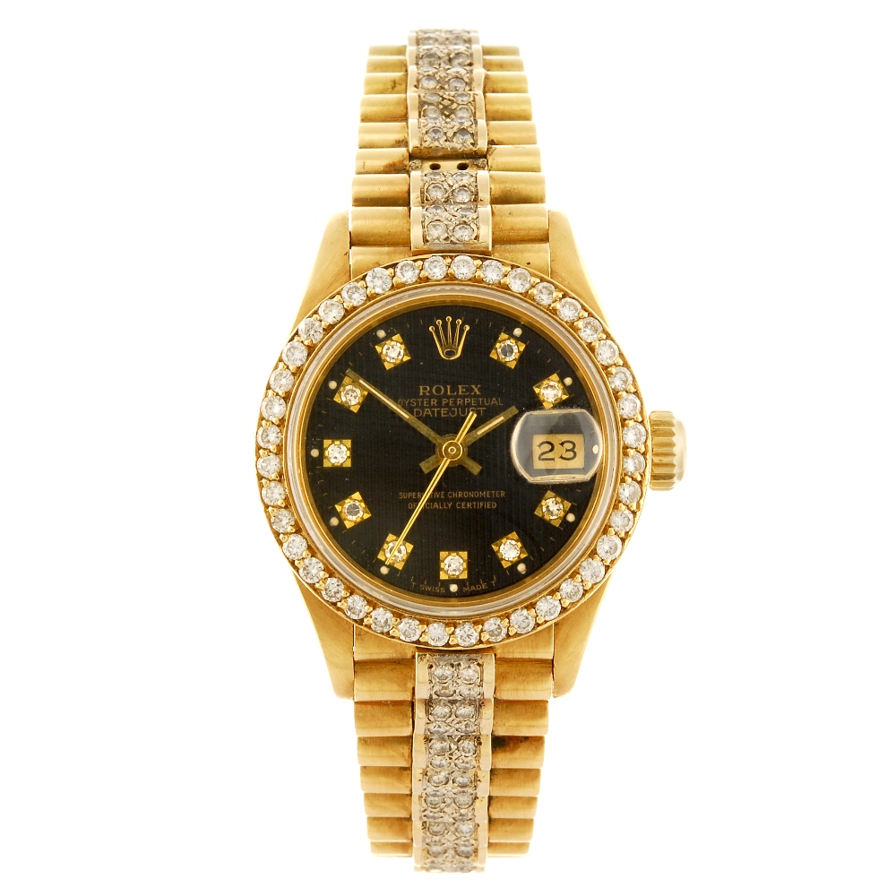 ROLEX - a lady's Oyster Perpetual Datejust bracelet watch. Circa 1988. 18ct yellow gold case with