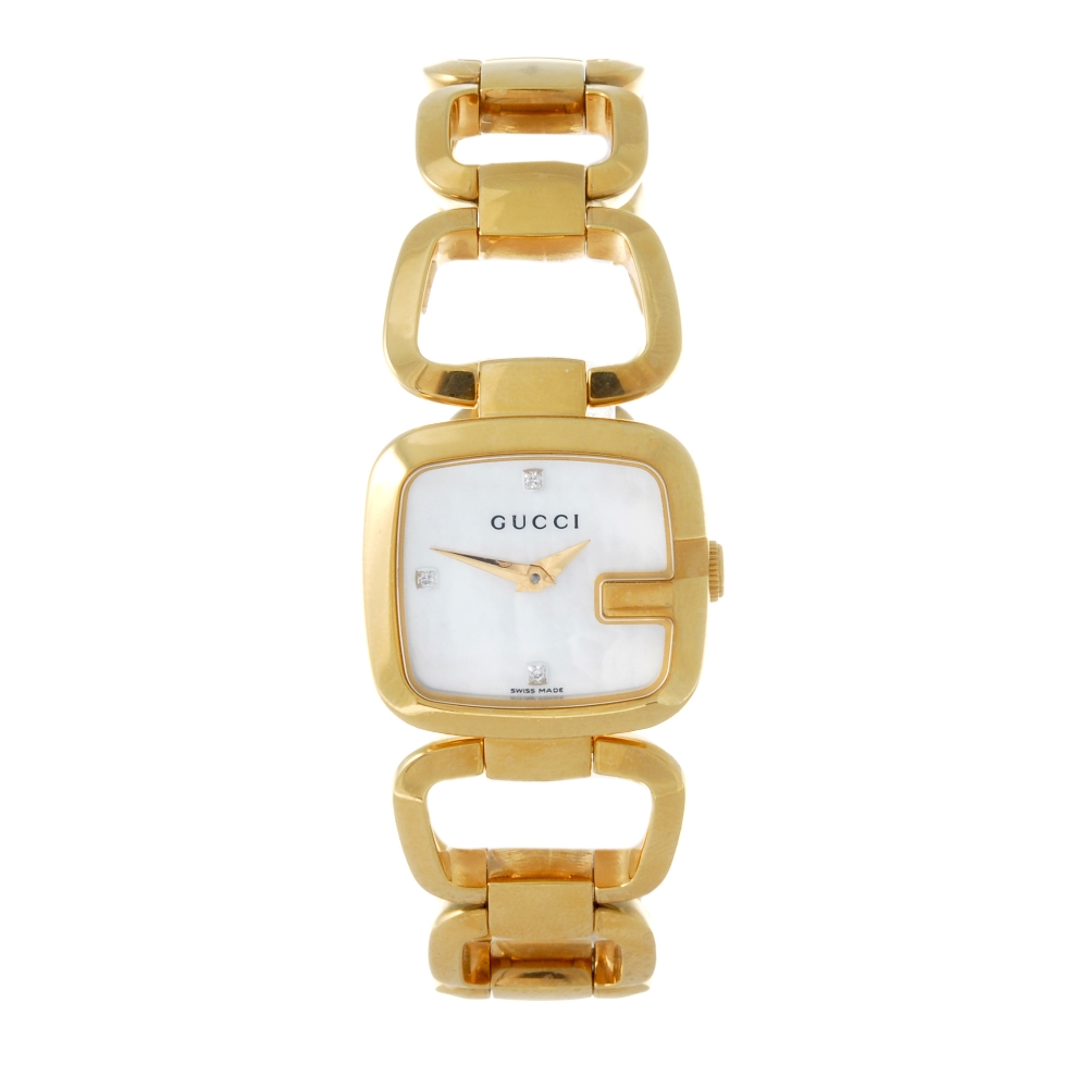 GUCCI - a lady's 125.5 bracelet watch. Rose gold plated case. Numbered 13337301. Signed quartz