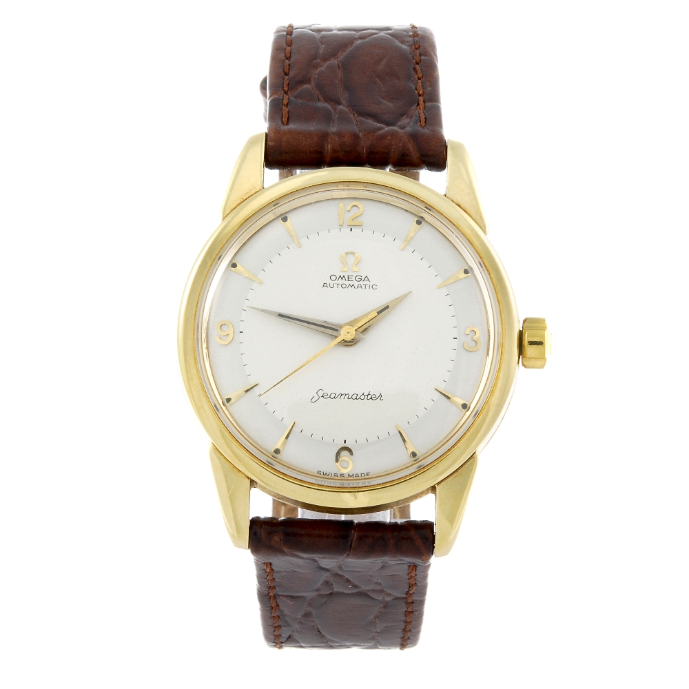 OMEGA - a gentleman's Seamaster wrist watch. 18ct yellow gold case, hallmarked Birmingham 1957.