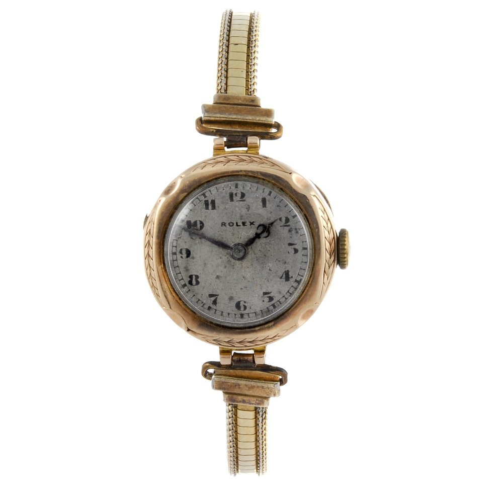 ROLEX - a lady's bracelet watch. 9ct yellow gold case with presentation inscription to rear,