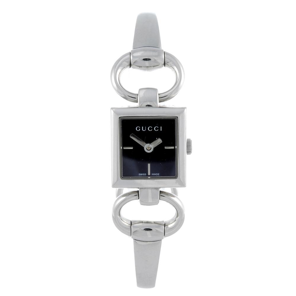 GUCCI - a lady's 120 bracelet watch. Stainless steel case. Numbered 11688826. Signed quartz