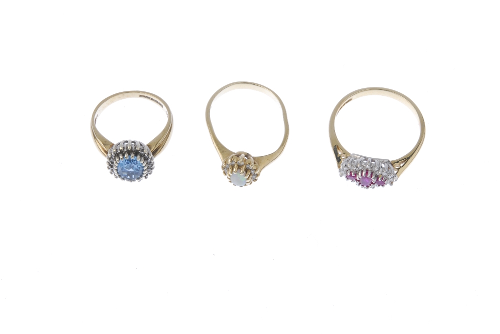 A selection of three 9ct gold diamond and gem-set cluster rings. To include a ruby and diamond ring, - Image 2 of 3