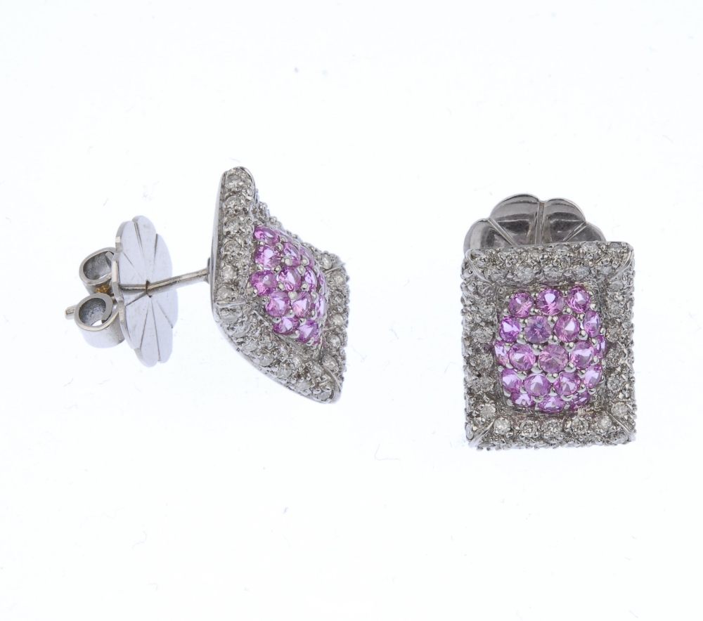 (117589) A pair of diamond and sapphire ear studs. Of curved rectangular form, the pave-set pink - Image 3 of 3