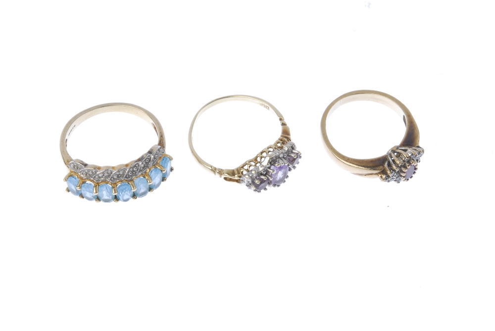 Three 9ct gold gem-set and diamond rings. To include a 9ct gold blue topaz and diamond point dress - Image 3 of 4