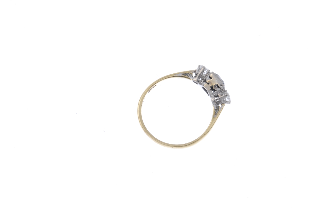 A mid 20th century 18ct gold sapphire and diamond three-stone ring. The square-shape sapphire, to - Image 4 of 4