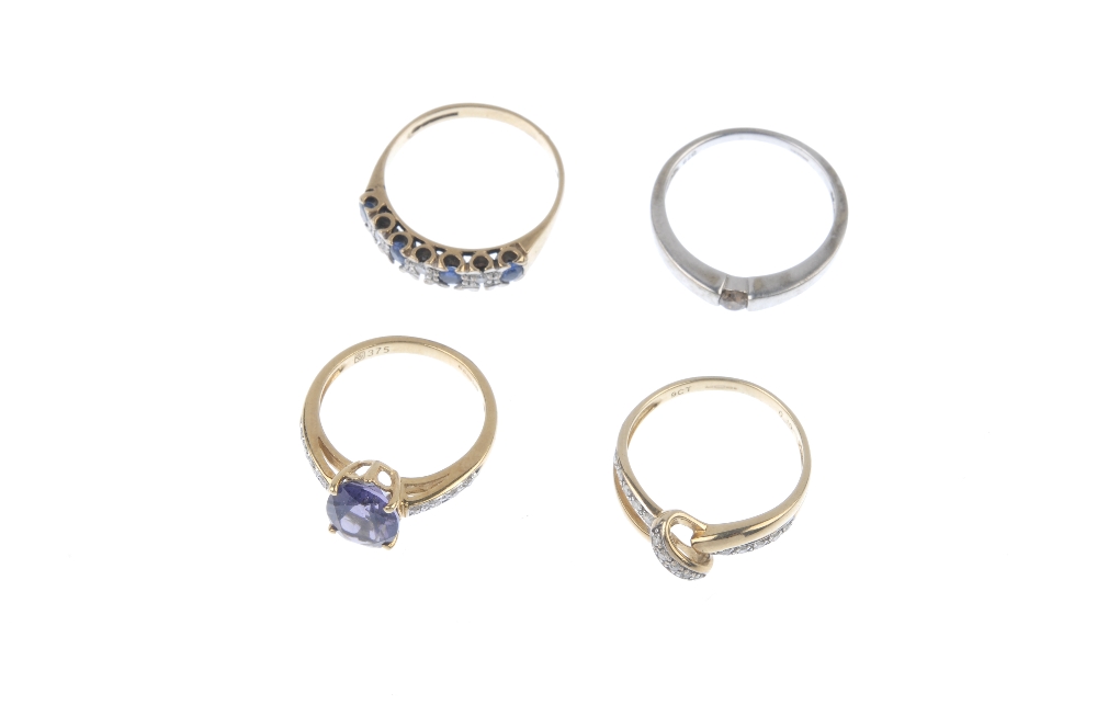 A selection of four 9ct gold diamond and gem-set rings. To include a diamond stylised knot ring, a - Image 2 of 4