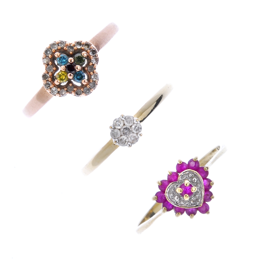 A selection of three 9ct gold diamond and gem-set rings. To include a colour-treated diamond and