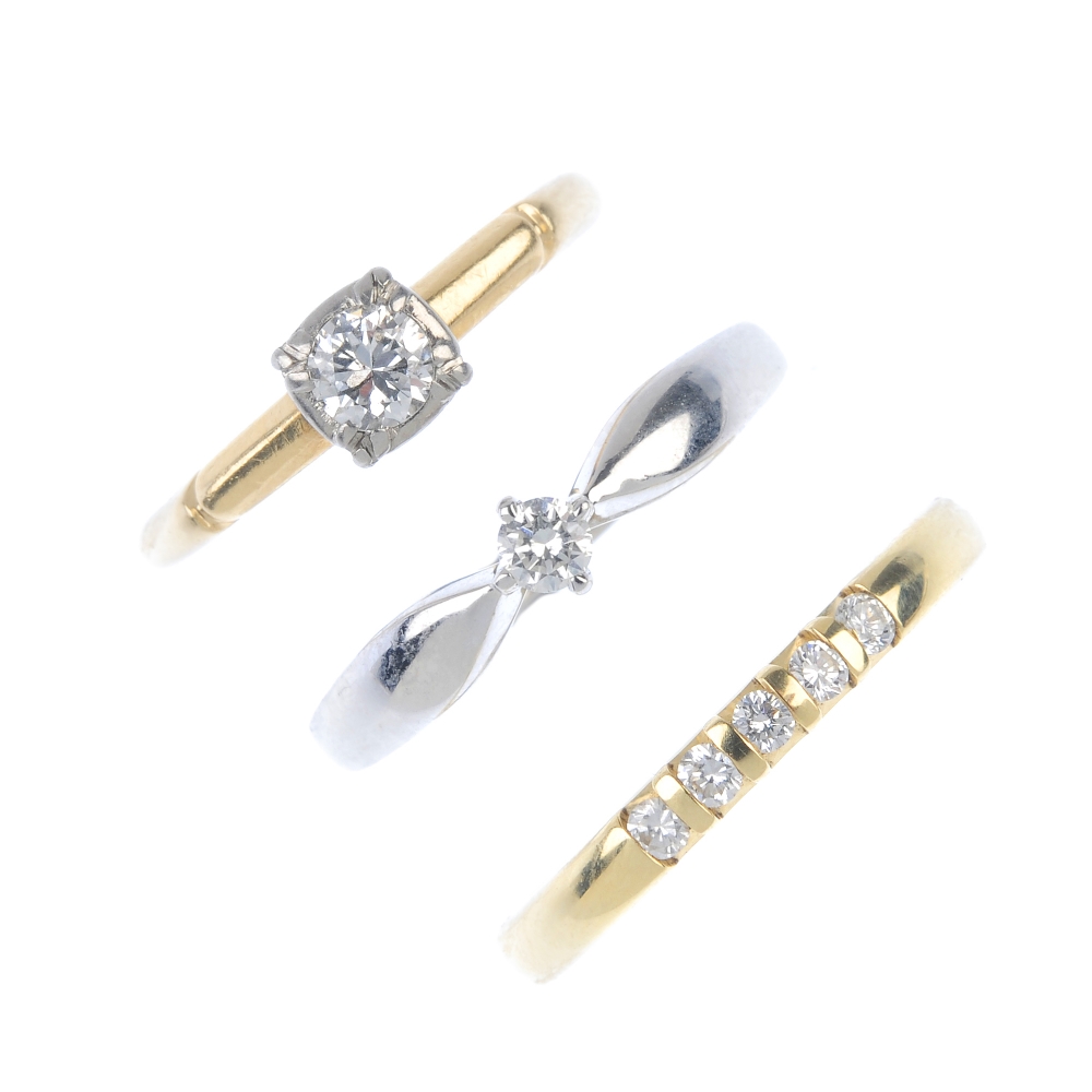 A selection of three diamond rings. To include two brilliant-cut diamond single-stone rings,