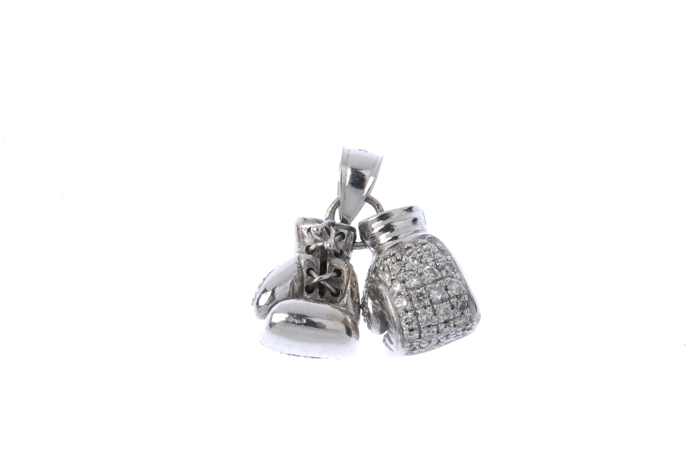 A diamond boxing gloves pendant. Designed as two brilliant-cut diamond boxing gloves, to the tapered - Image 2 of 2