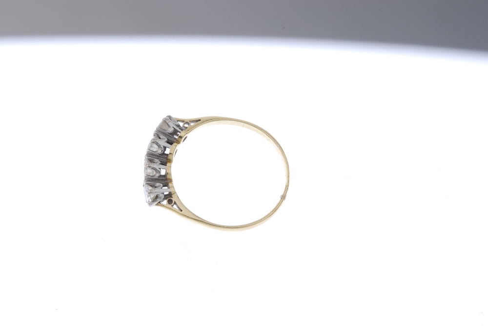 A diamond four-stone ring. The brilliant-cut diamond line, to the plain band. Estimated total - Image 3 of 4