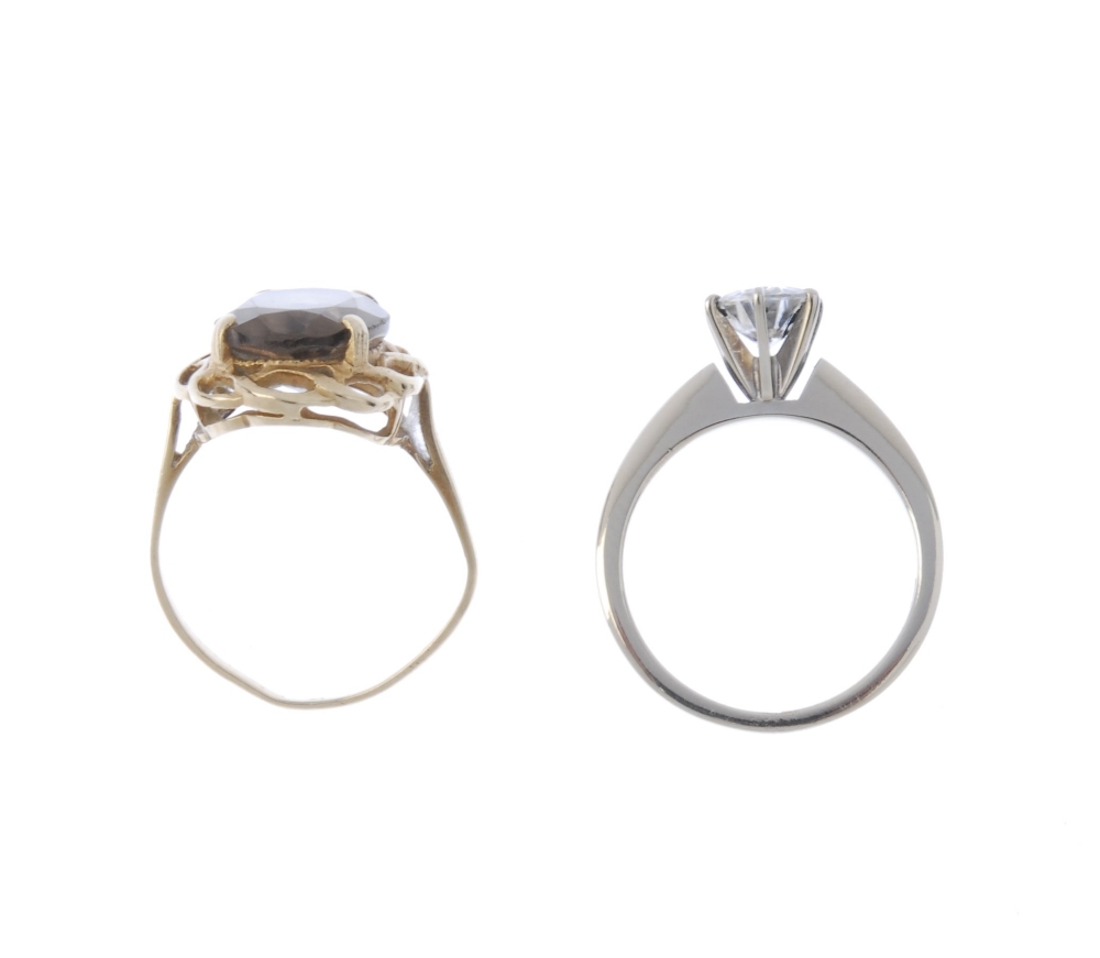 Two gem-set rings. To include, a 9ct gold oval-shape Smokey quartz ring within an openwork surround, - Image 2 of 3