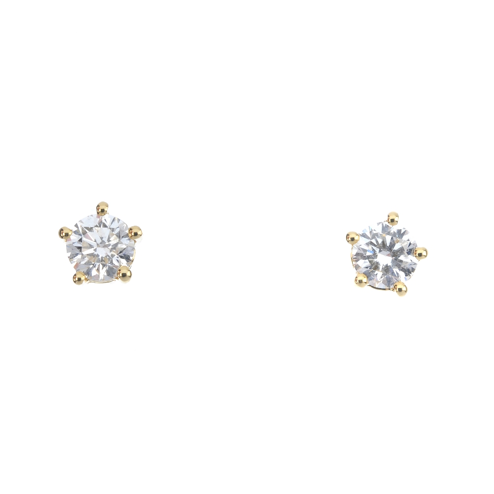 A pair of brilliant-cut diamond ear studs. Estimated total diamond weight 0.50ct, H-I colour, VS