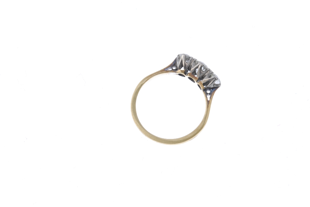A mid 20th century 18ct gold and platinum diamond three-stone ring. The graduated circular-cut - Image 4 of 4