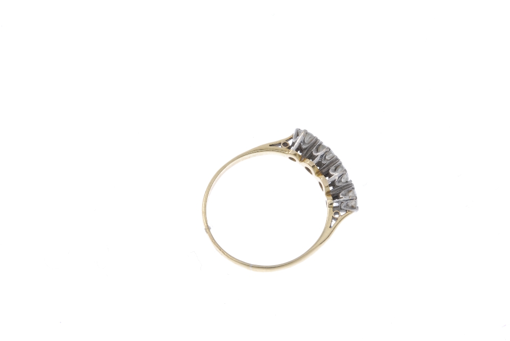 A diamond four-stone ring. The brilliant-cut diamond line, to the plain band. Estimated total - Image 4 of 4