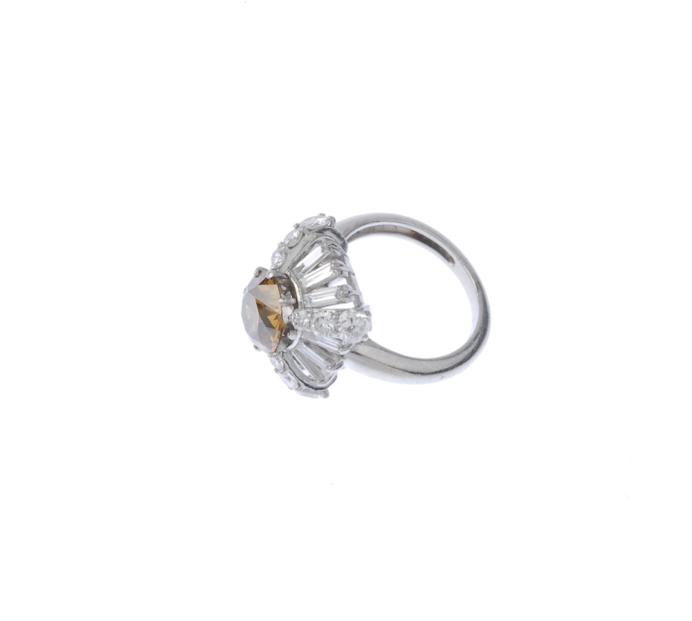 (541162-3-A) A coloured diamond and diamond dress ring. The circular-cut 'brown' diamond, within a - Image 3 of 4