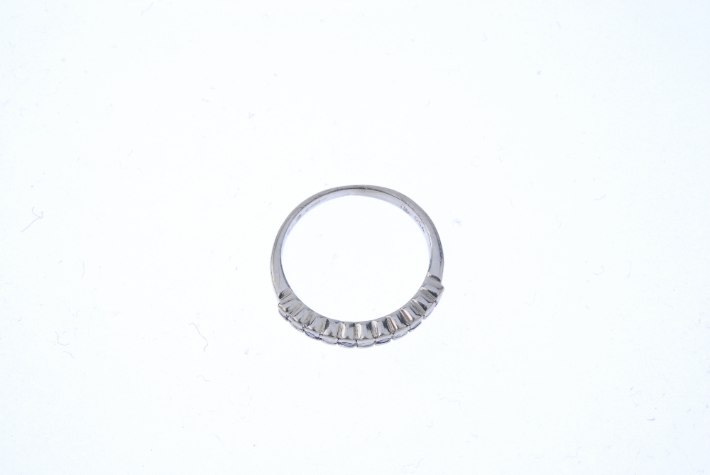 An 18ct gold sapphire and diamond half-circle eternity ring. The alternating circular-shape sapphire - Image 2 of 4