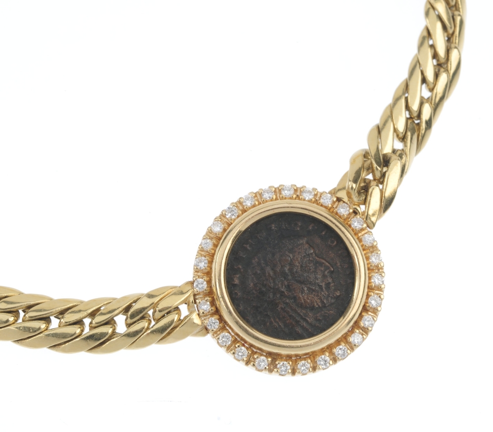 A 'coin' and diamond necklace. The coin-medallion, within a brilliant-cut diamond surround, to the - Image 2 of 4