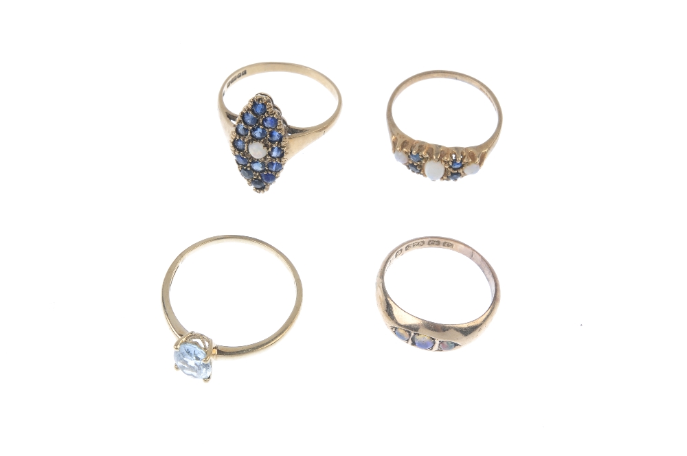 Four 9ct gold gem-set rings. To include an Edwardian opal three-stone band ring, an opal and - Image 2 of 3