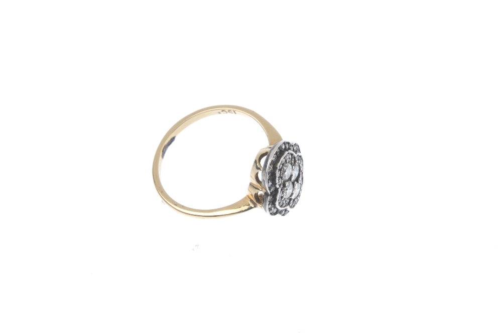 A diamond cluster ring. The brilliant-cut diamond quatrefoil, within a similarly-cut diamond - Image 3 of 4