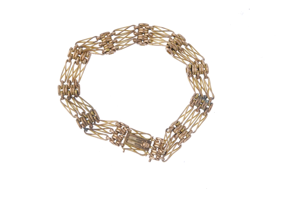 An early 20th century 9ct gold bracelet. Designed as a series of fancy gate-links and brick-links, - Image 3 of 3