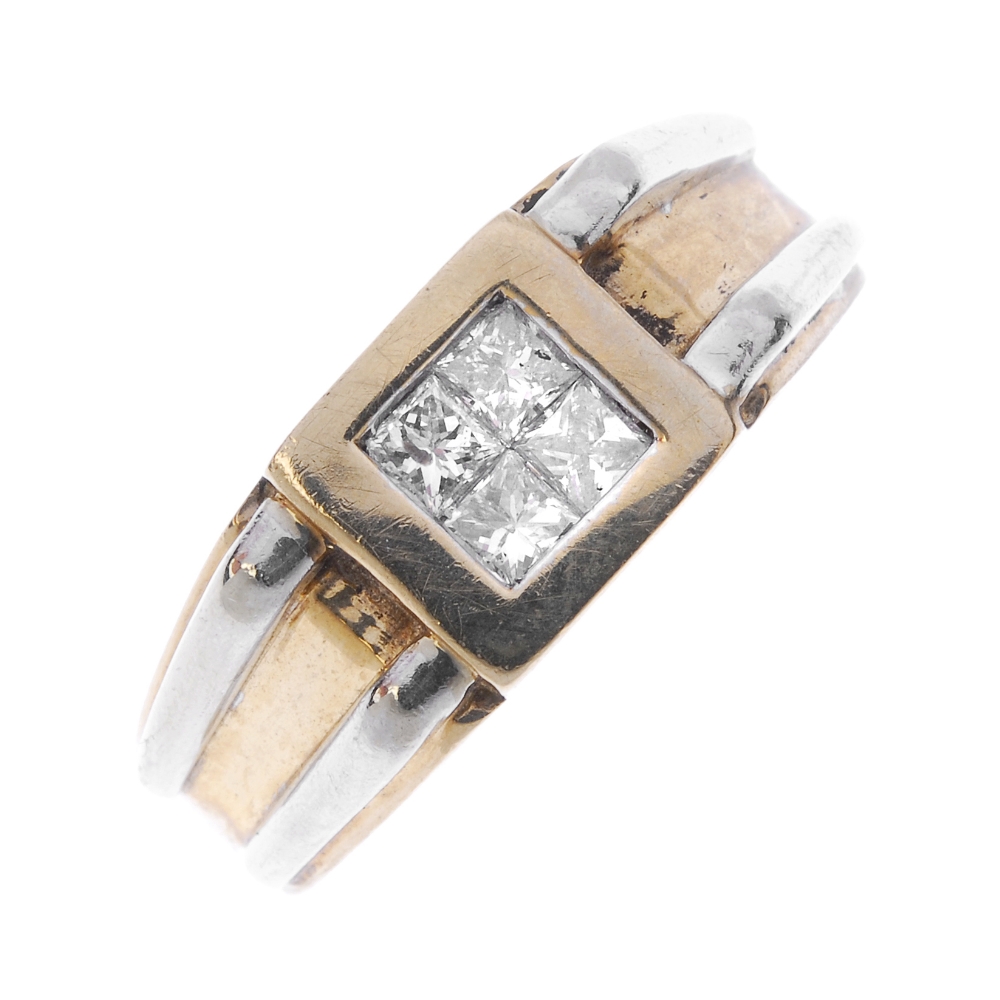 A gentleman's 9ct gold diamond ring. The square-shape diamond four-stone panel, to the bi-colour