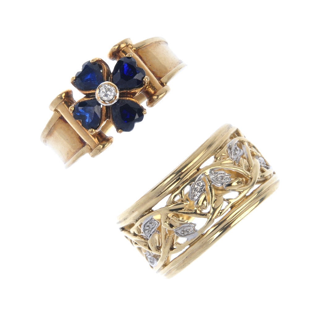 Two 9ct gold dress rings. The first designed as a synthetic sapphire floral cluster ring with bar