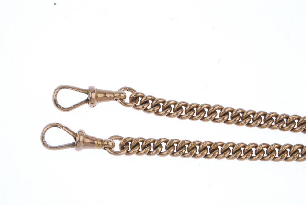 An early 20th century 9ct gold Albert chain. The curb-link Albert chain, suspending a T-bar, with - Image 2 of 3