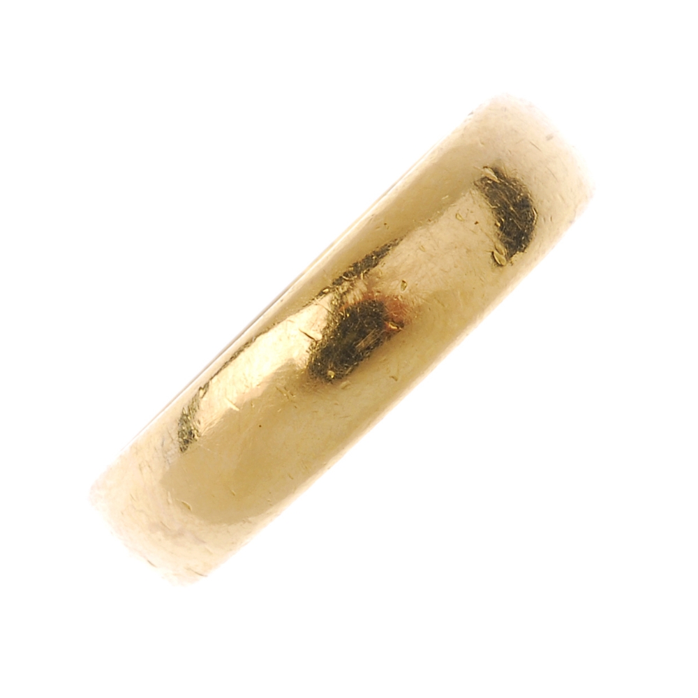 An early 20th century 22ct gold band ring. Hallmarks for Birmingham, 1905. Width 5mms. Weight 7.