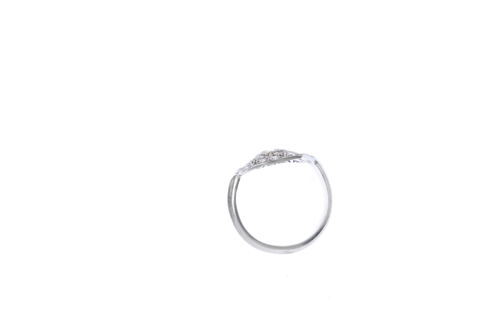 A diamond cluster ring. Of openwork design, the brilliant-cut diamond collet, within a single-cut - Image 4 of 4