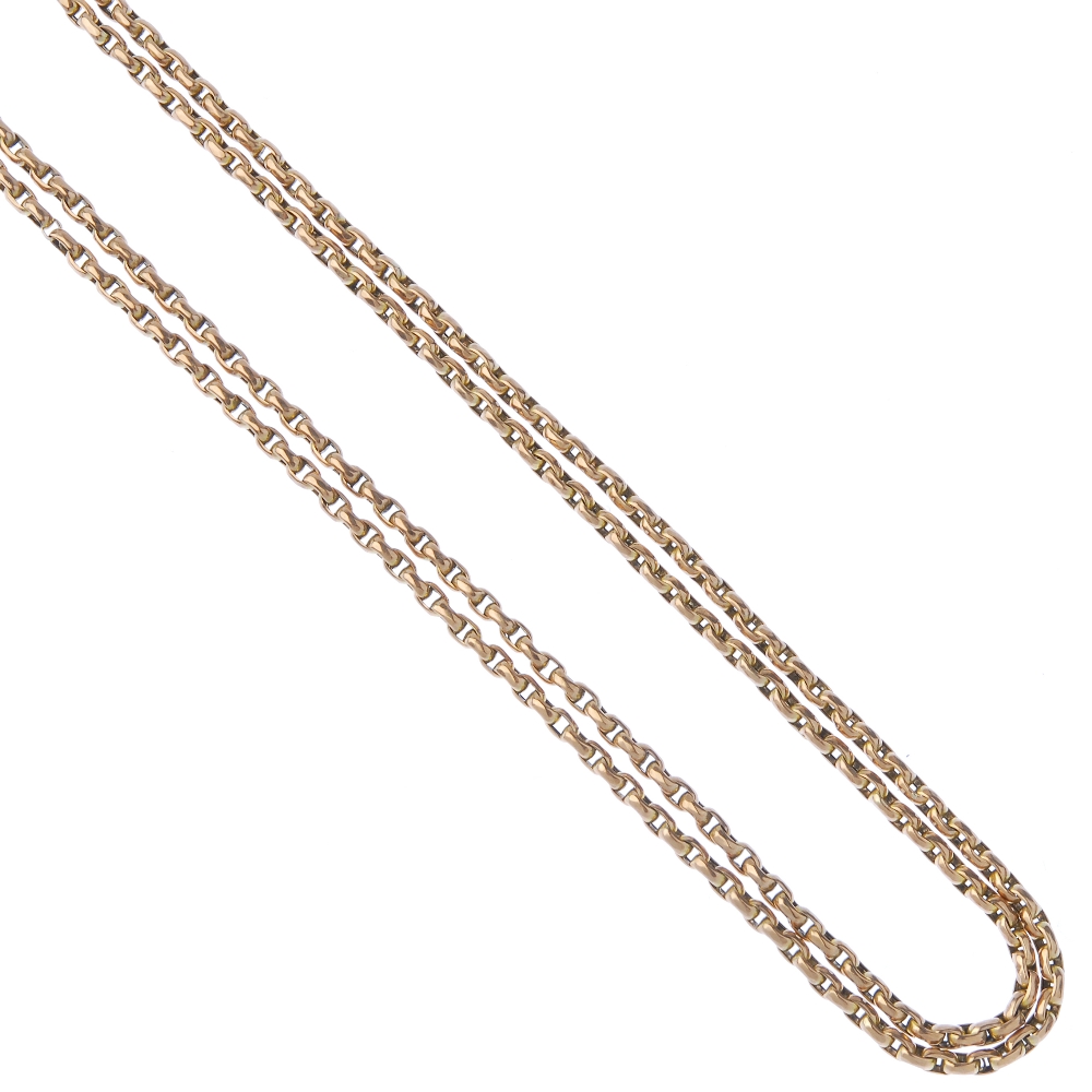 An early 20th century 9ct gold longuard chain. The faceted belcher-link chain, with lobster claw