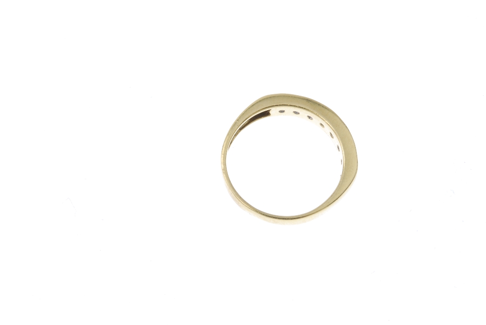 An 18ct gold diamond half-circle eternity ring. The brilliant-cut diamond line, to the tapered - Image 4 of 4