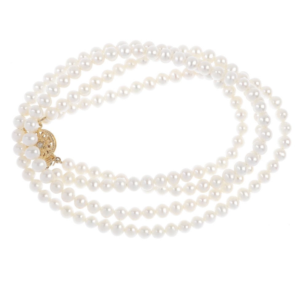 A freshwater cultured pearl two-row necklace. Each row comprising a series of uniform freshwater - Image 2 of 2