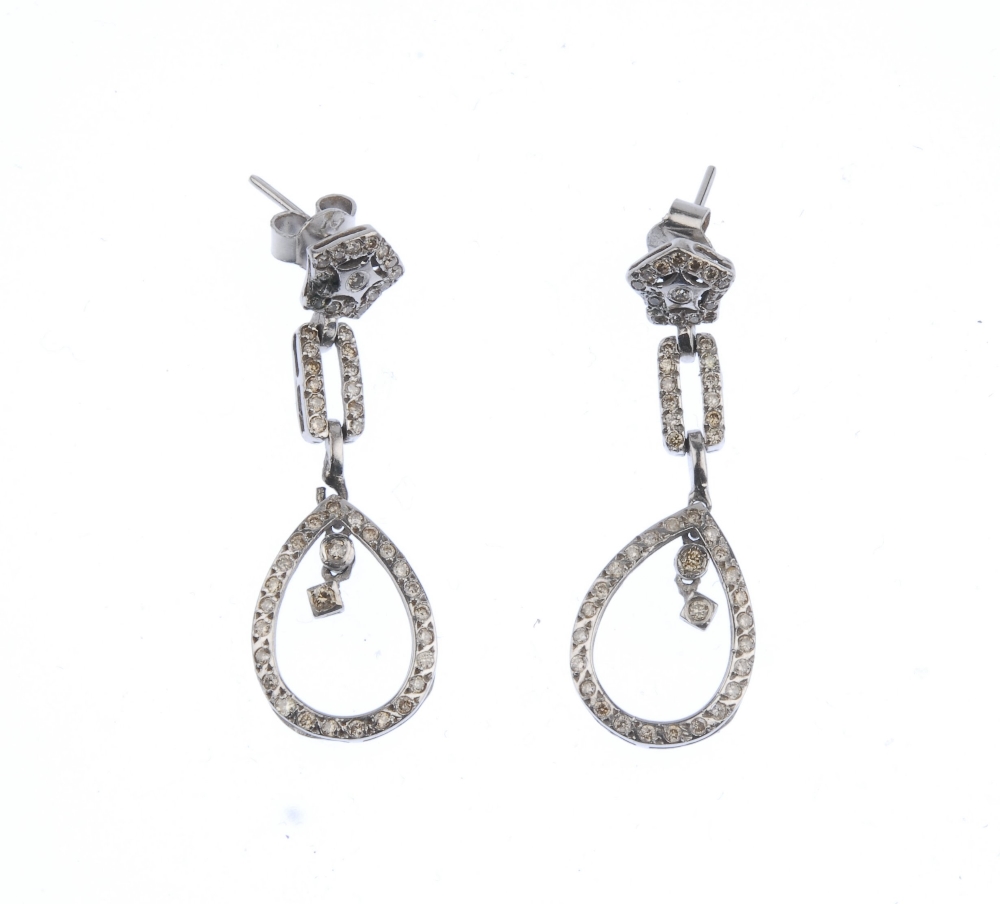 (176761) A pair of pave-set diamond ear pendants. Each designed as a pear-shape dropper to the - Image 3 of 3